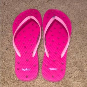 Flip flops, to wear around the pool side.